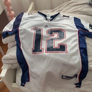 Brady jersy bought NFL store.